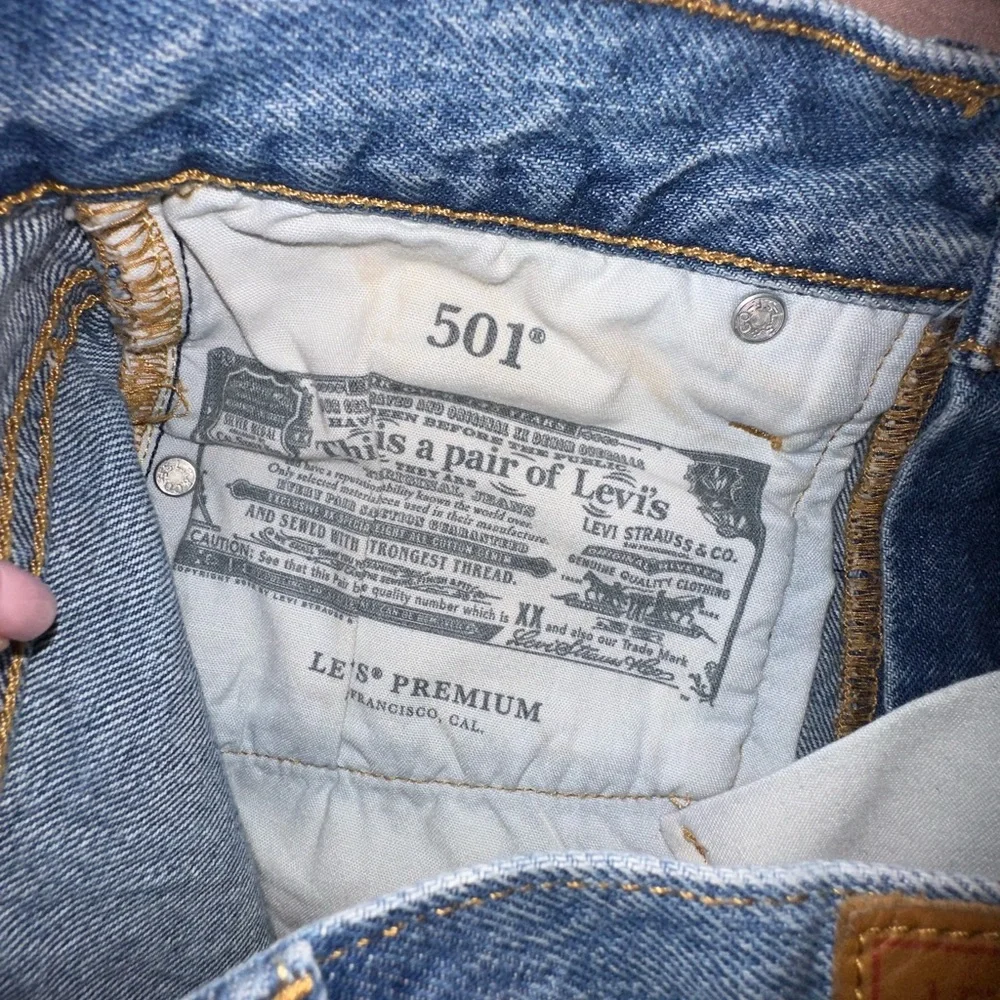 Levi's premium denim button fly Distressed Blue 501 Jean Shorts 25